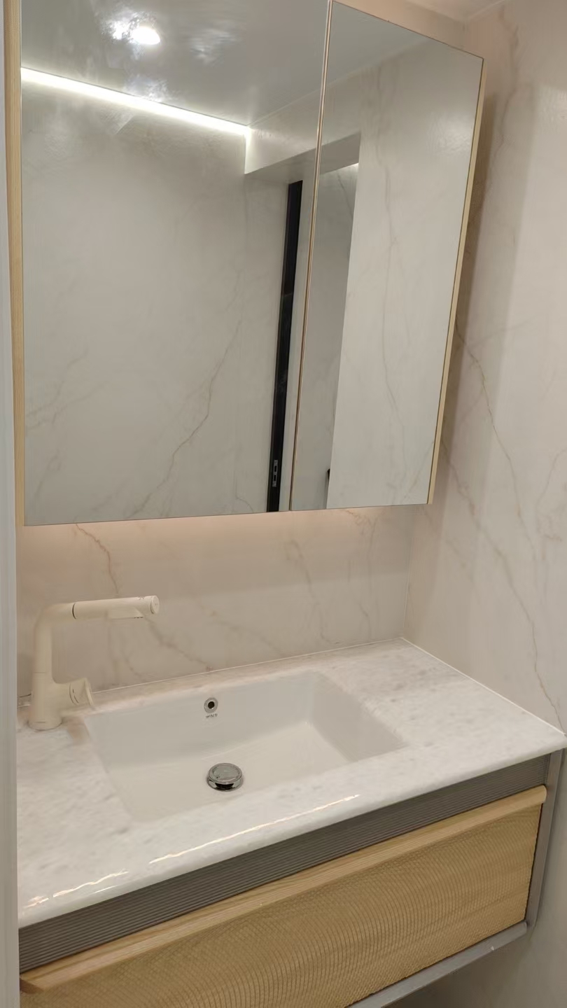 Tianhe Marina Penthouse — marble vanity top with under-mount basin
