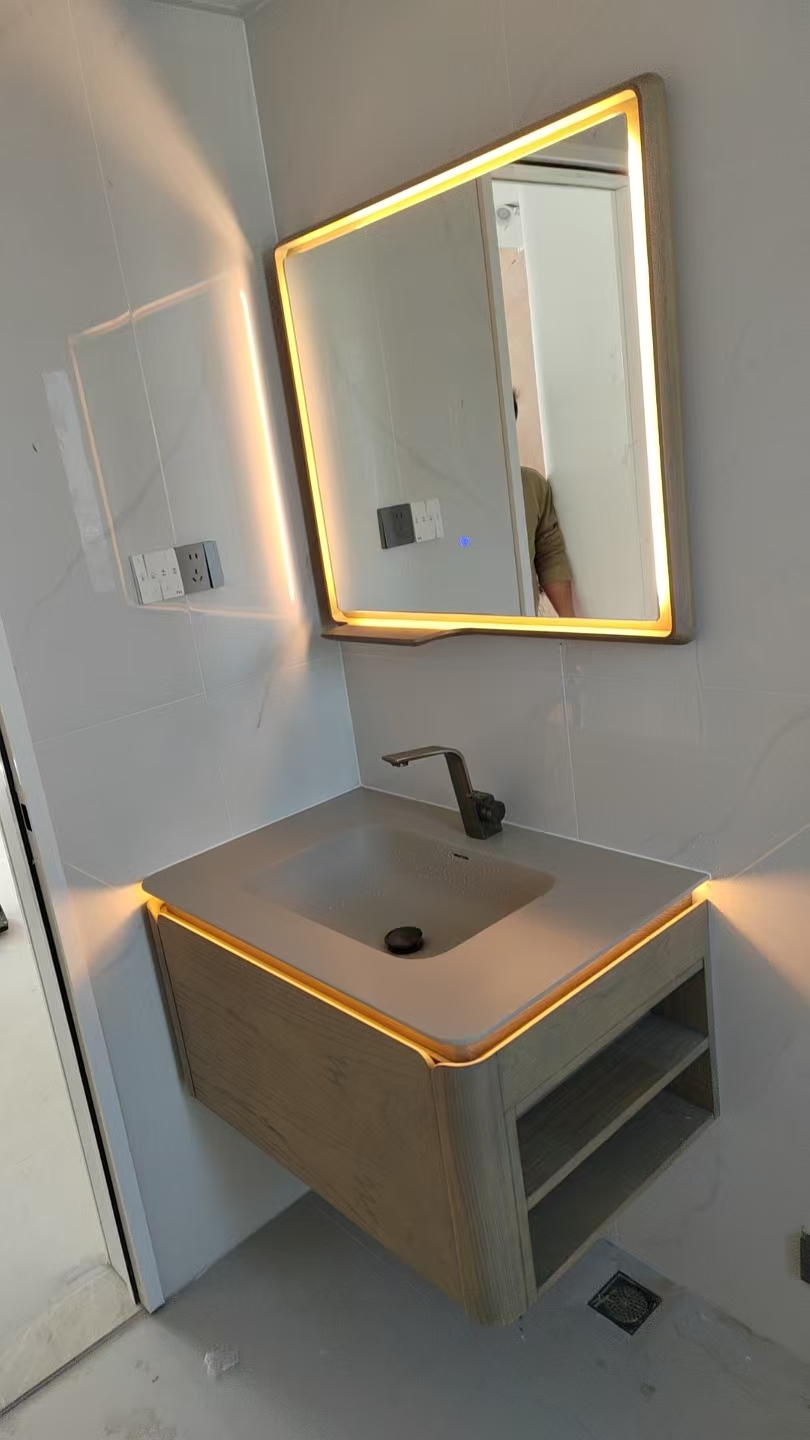 Helenburg Heritage Suite — ash wood vanity with warm LED-lit mirror